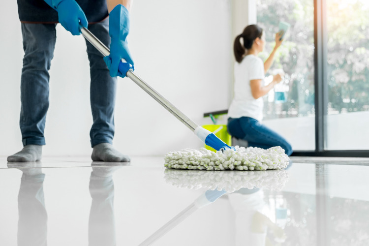 Corporate cleaning service on floor and glass window