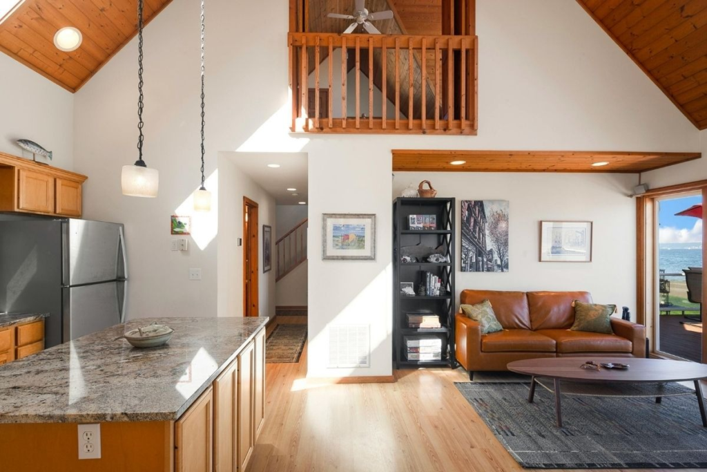 Sunlit, debris-free living room proving that regular deep cleaning improves indoor air quality effectively.
